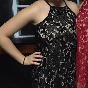 Francesca’s black lace dress